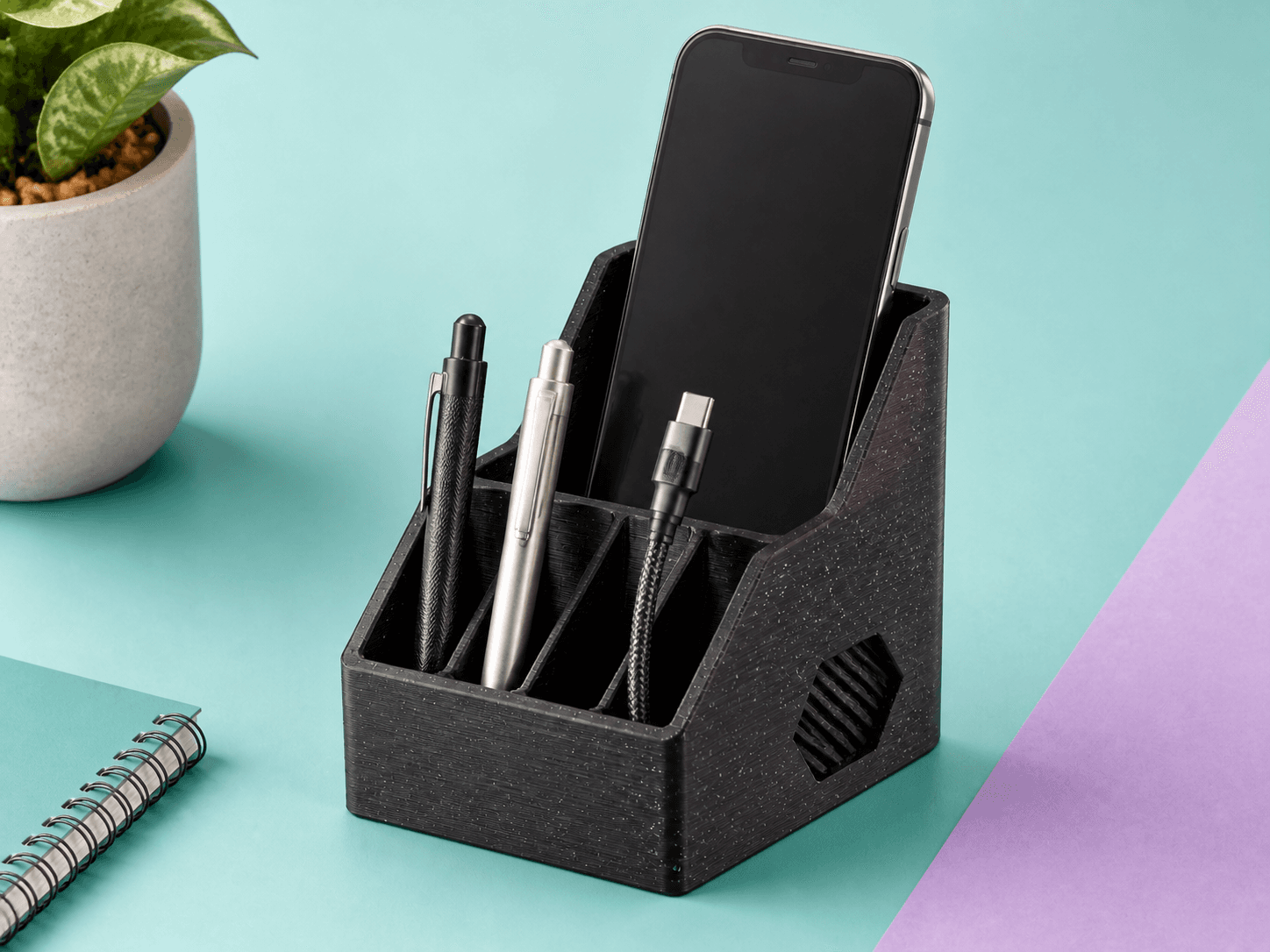 Organizador de escritorio con teléfono, bolígrafos y cable